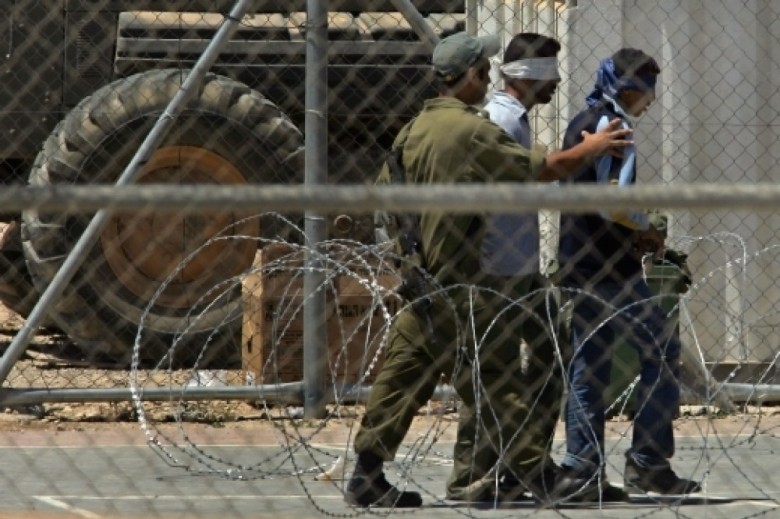 Israeli occupation forces detain at least 17 Palestinians in raids at their homes in the occupied territories