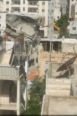 West Jerusalem Israeli municipality demolishes Palestinian-owned 16-apartment building
