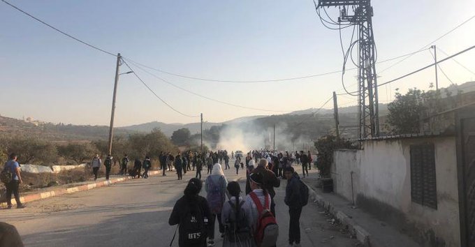 Teargas canisters fired by Israeli soldiers fall into West Bank schoolyard causing suffocation among students