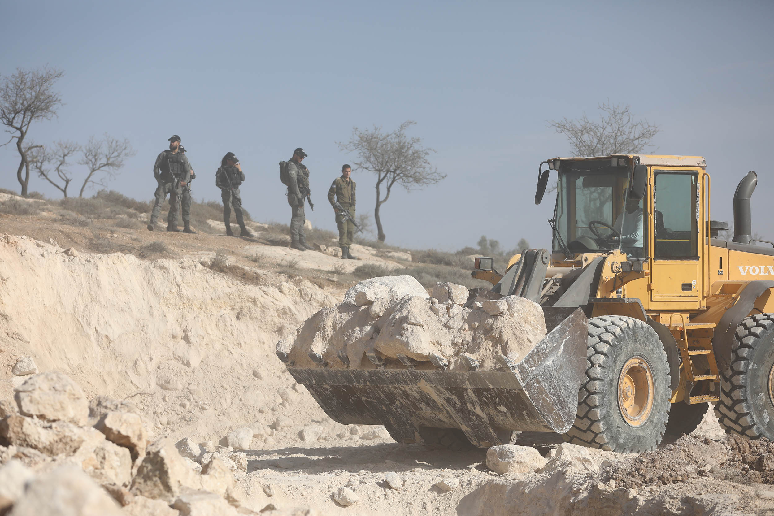 Israeli forces remove fence, raze plot of land in Hebron