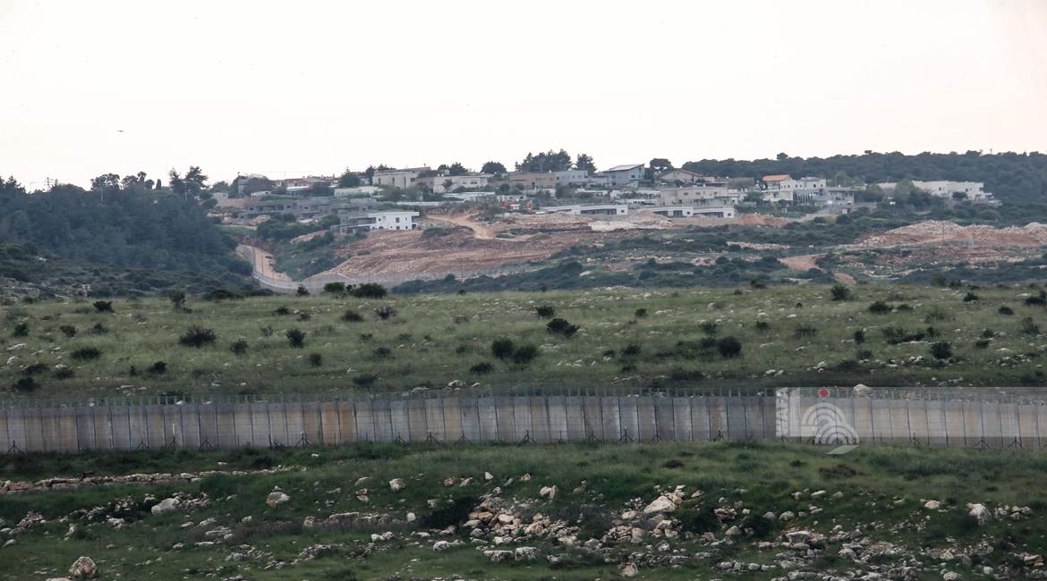 A view of a section of the Israeli segregation barrier near Jenin (WAFA Archive)