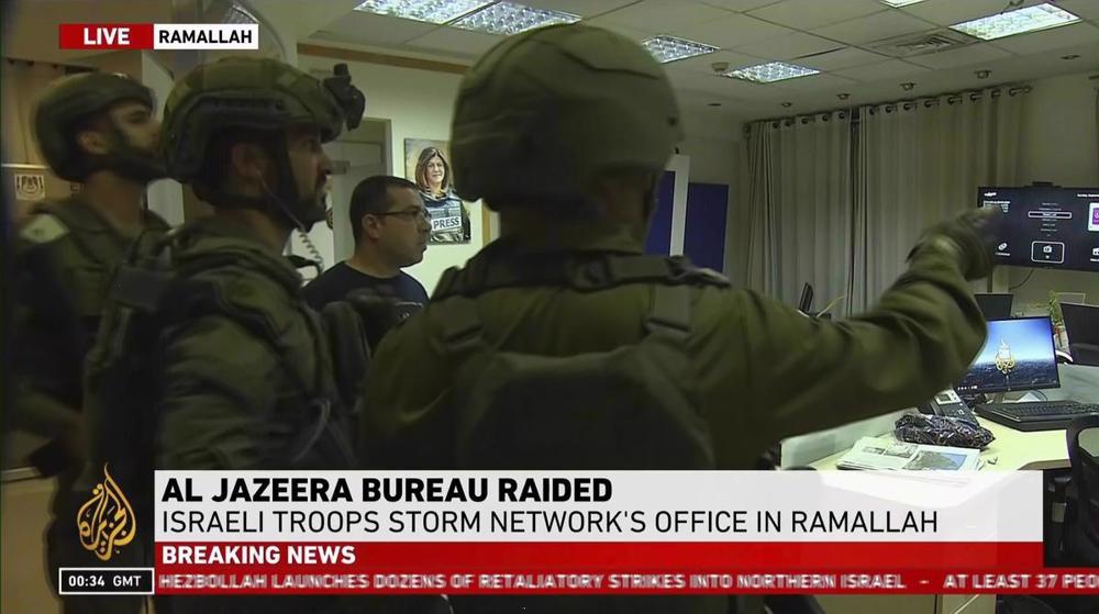 Israeli occupation forces raid and shut down Al Jazeera office in Ramallah