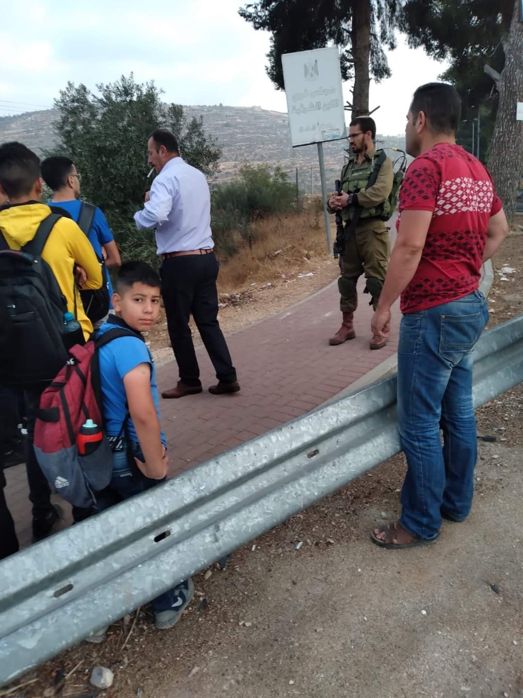 Israeli occupation soldiers prevent students from accessing their school in West Bank village