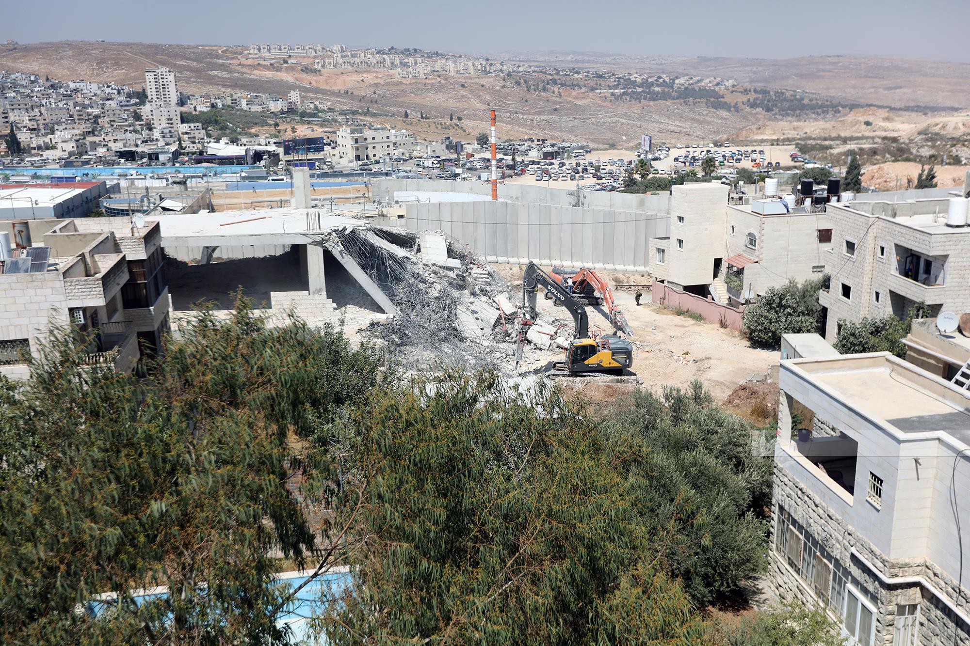 Israeli forces demolish three-story building south of Bethlehem
