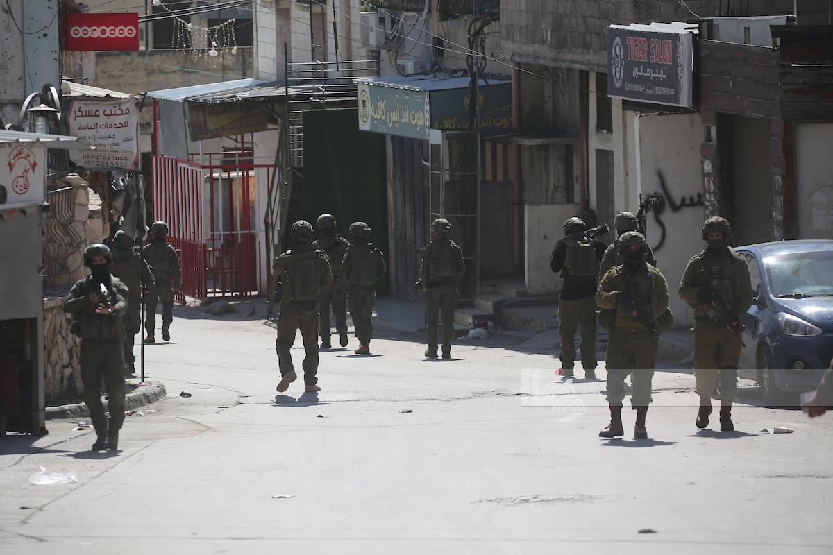 Israeli occupation forces continue their aggression on Old Askar Camp, east of Nablus (WAFA Image).