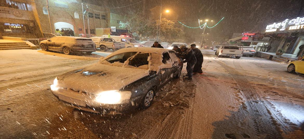 Bad weather, snow causes damage to homes, forces shutdown of government, banks, and schools