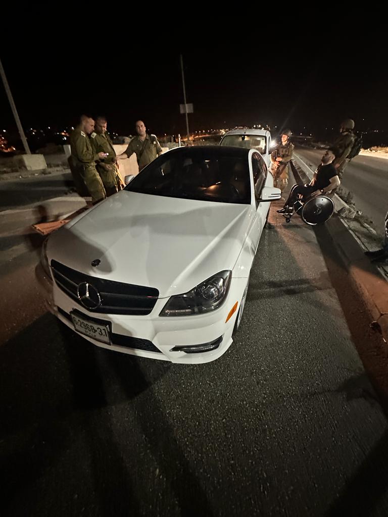 Israeli soldiers forced a disabled Palestinian man out of his car and then seized it