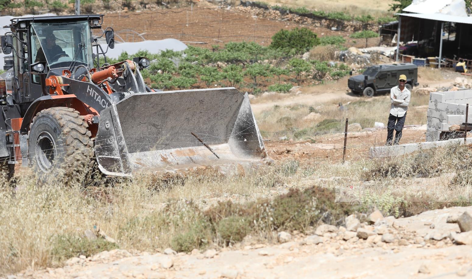 Israeli forces demolish agricultural structures, uproot trees near Hebron