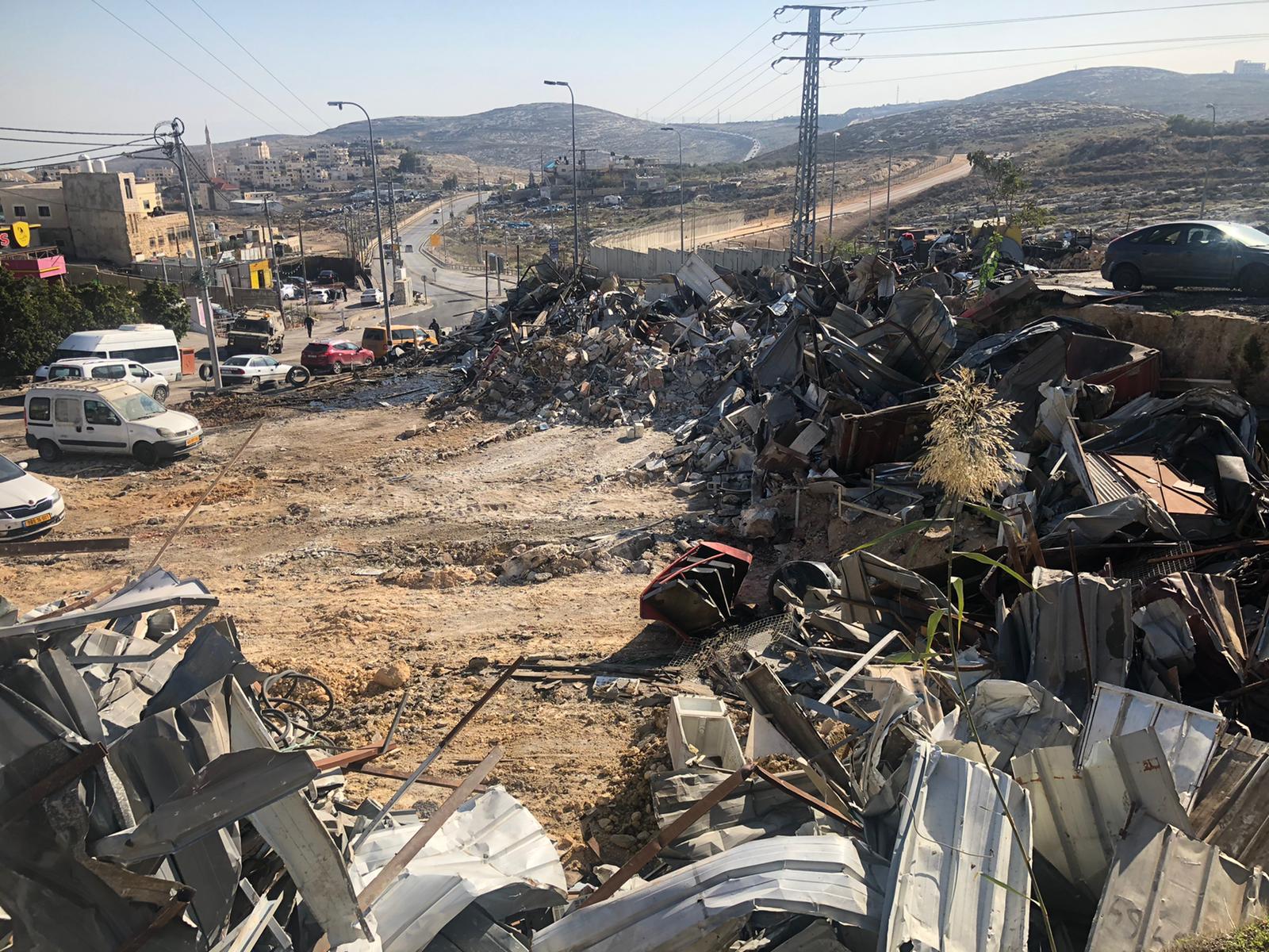 Ten Palestinian-owned car repair workshops demolished by Israel in Jerusalem-area town