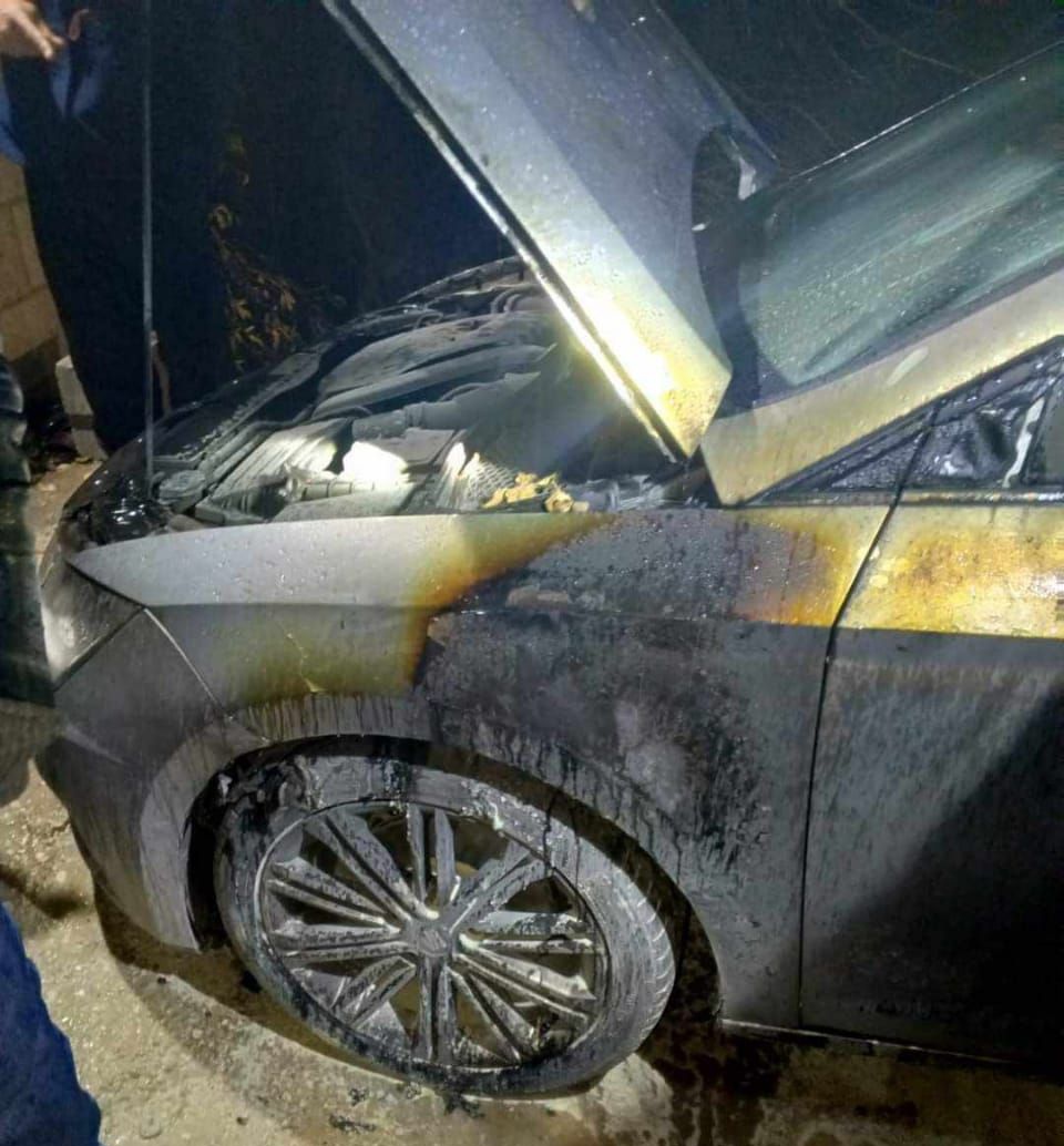 Israeli colonists torch vehicle and attack homes south of Nablus  