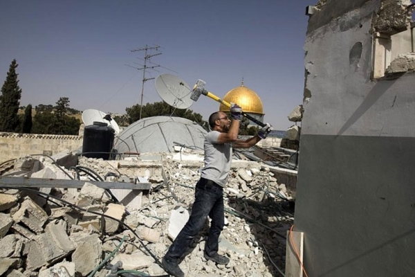 Israel forces two brothers to demolish their own houses in Jerusalem